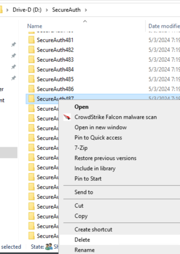 File Explorer showing a realm folder under D:\SecureAuth selected, with Delete highlighted in the right-click context menu.
