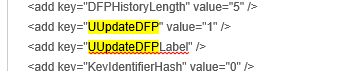 Web Config editor showing the UUpdateDFPLabel field with its value removed, highlighted.